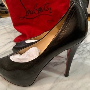 Christian Louboutin black pumps